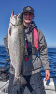 The author’s son Ryan with a fat ocean coho caught in late-September between Washington State and Vancouver Island in the Strait of Juan de Fuca. The fish was 30 feet deep in 500 feet of water.